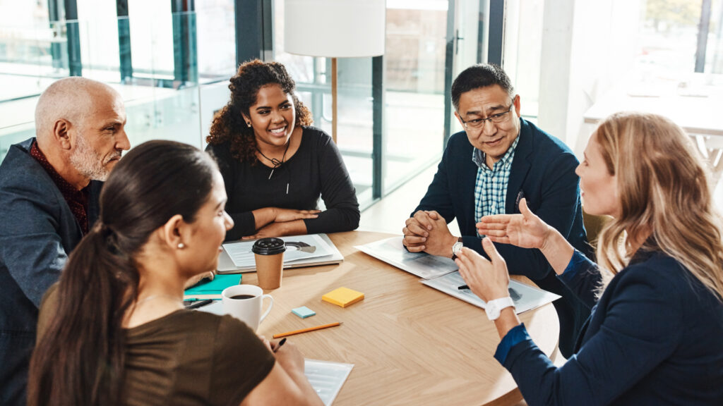 A diverse group of professionals discussing project management