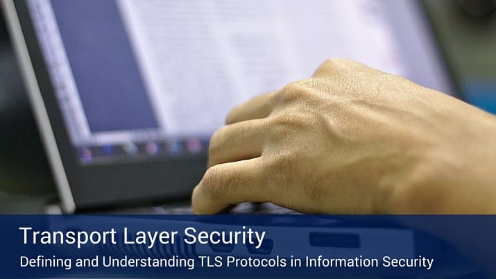 Close up of hands typing on a computer with a poster in the bottom of the picture that says "transport layer security".