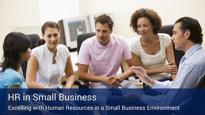 Five co-workers sitting on office chairs in a circle, while one woman talks about HR in small business.