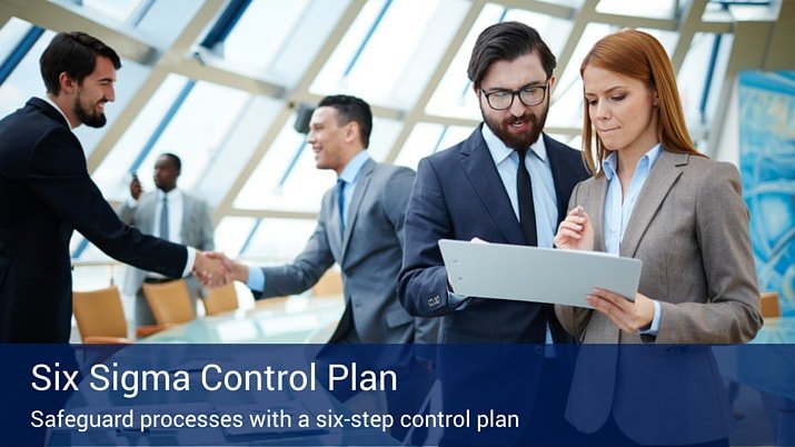 Two business people, one man and one woman, both looking at a clipboard together with two other businessmen in the background shaking hands, and there is a banner across the bottom of the image that reads "Six Sigma Control Plan".