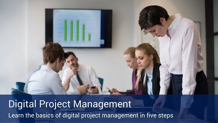 A conference room full of people sitting around a table looking down at paperwork with a tv screen in the background that has a green barchart on it, with a banner at the bottom of the image that says "Digital Project Management".
