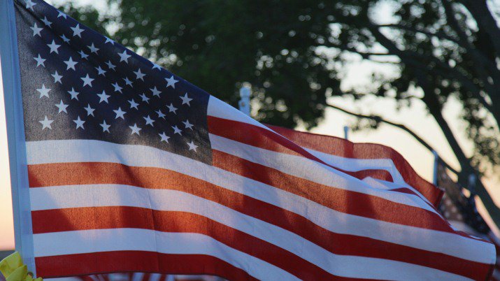 An American flag waving in the wind.